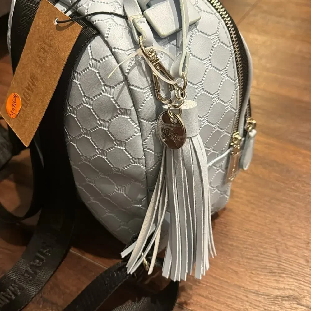 Steve Madden NWT Sky BBLogo Backpack w/front zip pocket and adjustable straps.